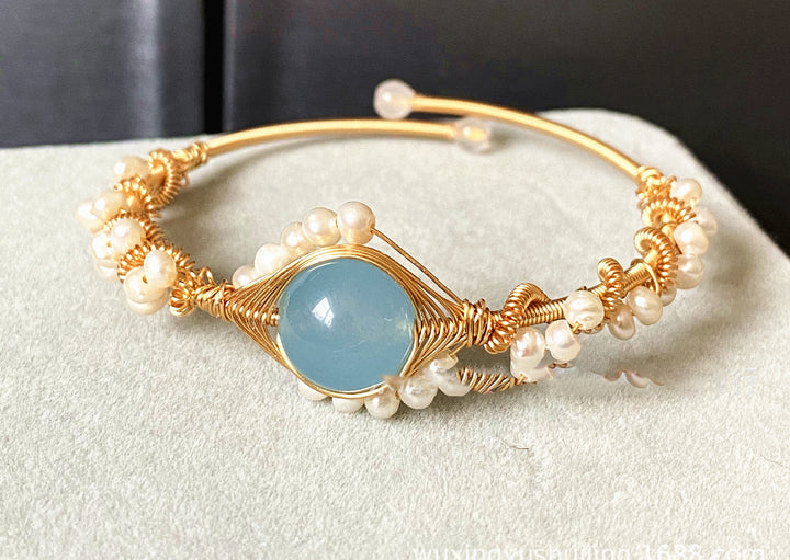 Gold braided wire cuff bracelet with pearls