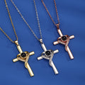 Gold cross heart projection necklace