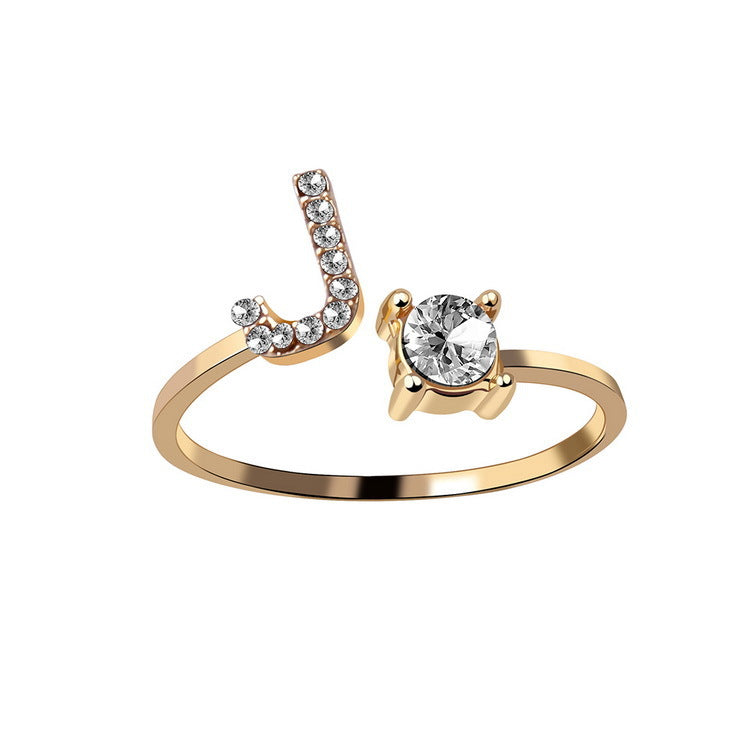 Gold adjustable initial ring with zircon letter