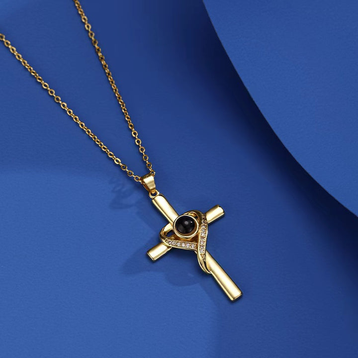 Gold cross heart projection necklace