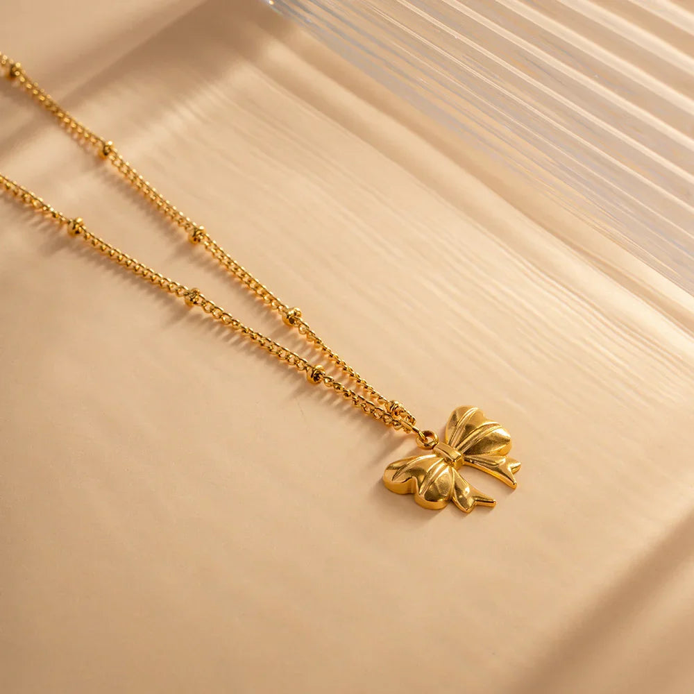 Gold-Plated Ribbon Necklace with Butterfly Pendant