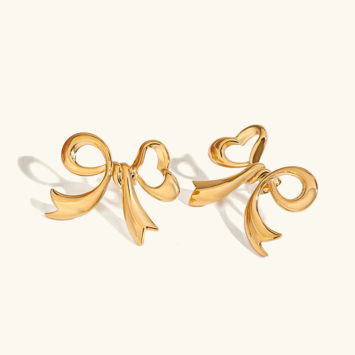 Women's Gold Bowtie Stud Earrings Sculptural Design
